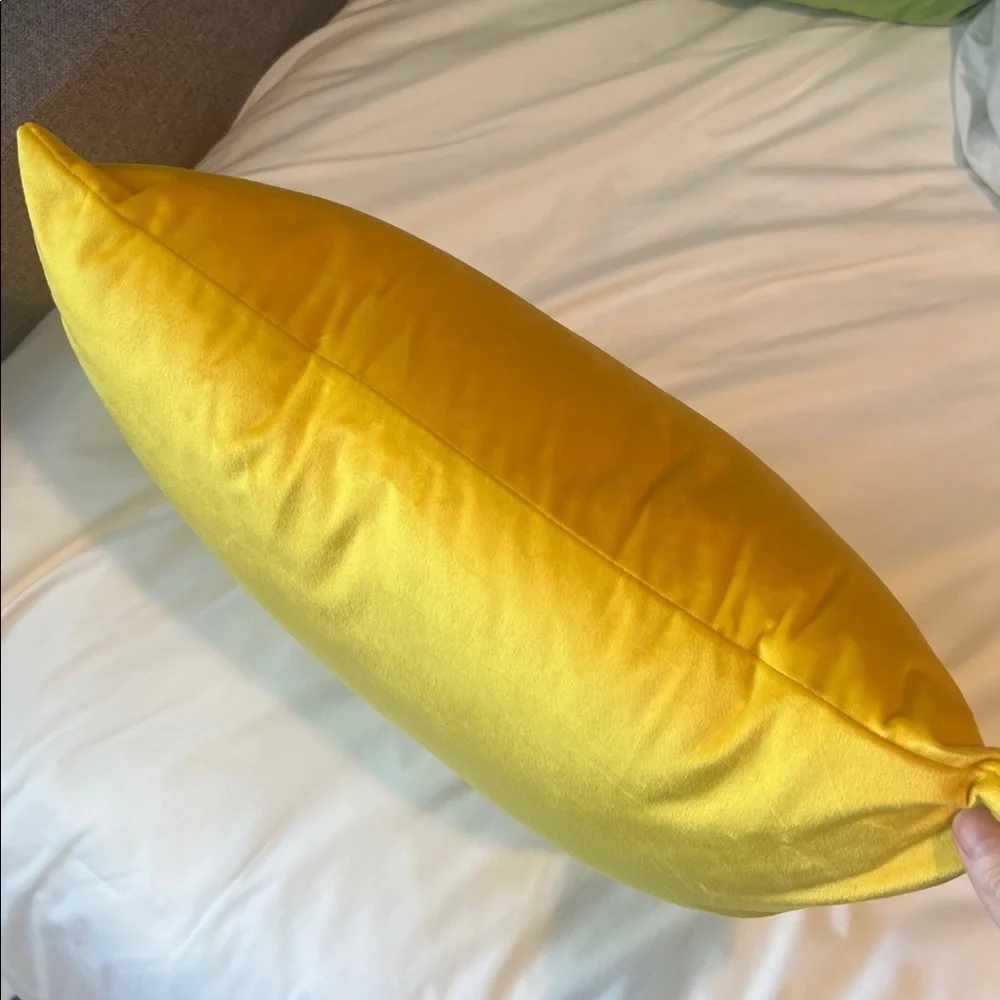 Yellow velvet throw pillow